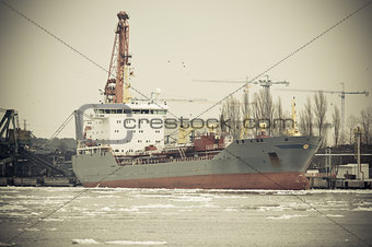 Industrial Container Cargo freight ship with working crane