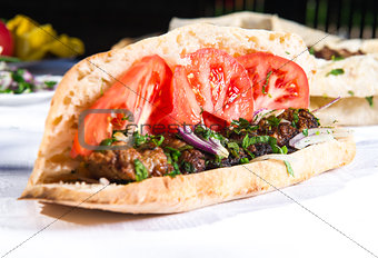 Lavash with grilled meat and vegetables
