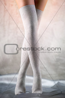 Beautiful woman legs in cotton stockings 