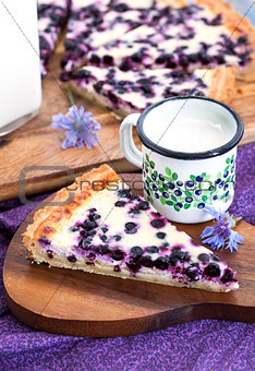 Homemade blueberry tart pie and milk