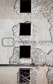 Brick wall of old destroyed house