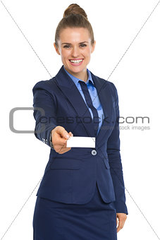 Portrait of happy business woman giving business card