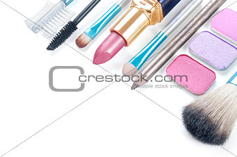 Close up view of make up objects on white back