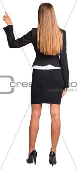 Businesswoman pointing her finger upward