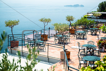 Empty open air restaurant at Amalfi coast, southern Italy