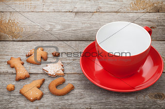 Coffee cup and gingerbread cookies
