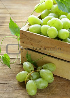 ripe fresh sweet organic grapes in a wooden box