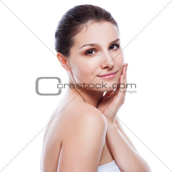 Beautiful face of young adult woman with clean fresh skin - isol