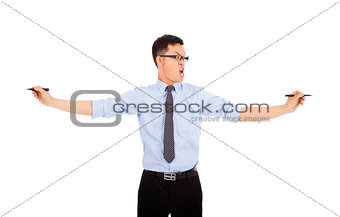 nervous  businessman holding pens to work . isolated on white