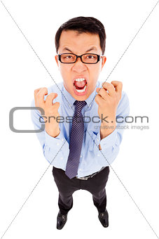 businessman yelling and make a fist . isolated on white