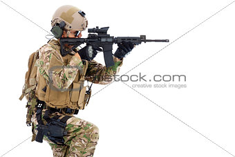 Soldier holding  rifle or sniper and ready to shot