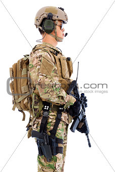 Soldier with rifle or sniper standing on a white background