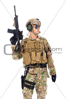 Soldier raising up  rifle or sniper with white background