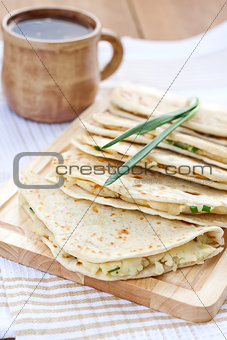 Flatbread with mashed potato and spring onion