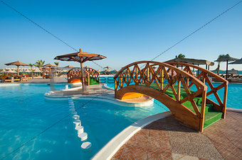 Swimming pool at tropical holiday resort