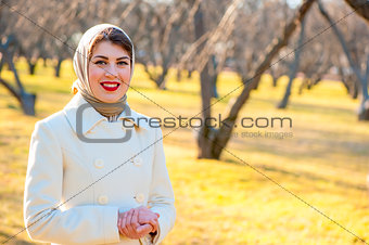 laughing girl walking in autumn park