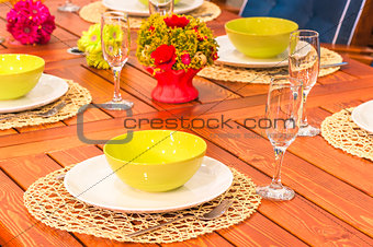 beautifully set table in bright colors