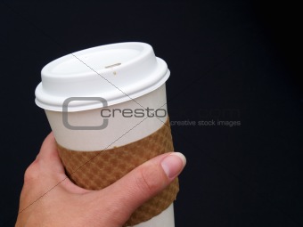 holding coffee cup