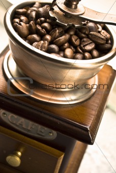 grinder with coffee beans  