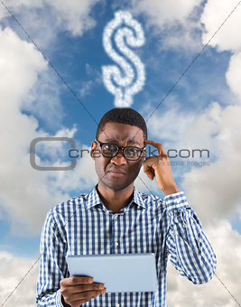 Composite image of young businessman thinking and holding tablet