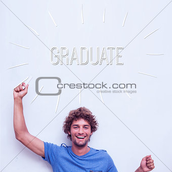 Graduate against happy student holding chalk