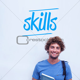 Skills against happy student holding book