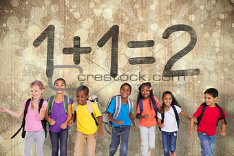 Composite image of elementary pupils running