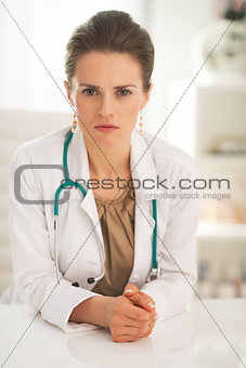 Portrait of confident doctor woman in office