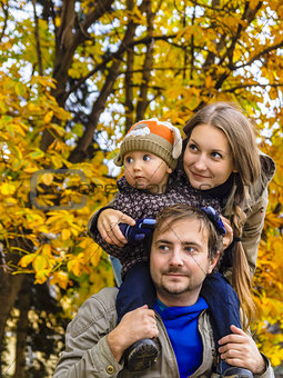 Family in autumn park look