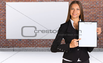 Businesswoman holding paper holder