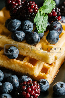 Waffles and fruit.