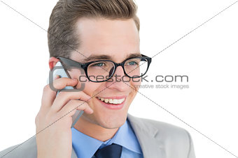 Nerdy businessman talking on phone