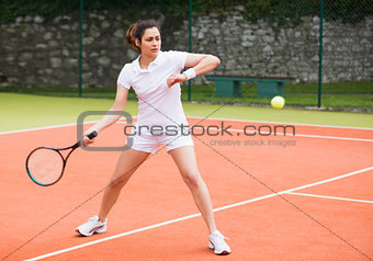 Tennis player playing a match on the court