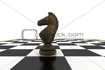 Black knight on chess board