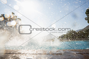 Splashing water in swimming pool