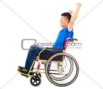 handicapped man sitting on a wheelchair and shouting