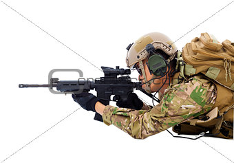  soldier holding rifle or sniper lying on the floor