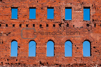 Ancient roman brick wall with blue sky.