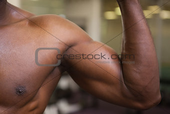Muscular man flexing muscles