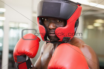 Male boxer in defensive stance