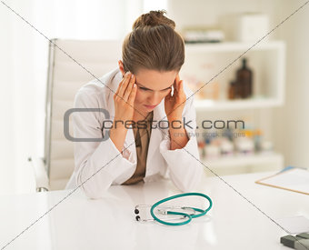 Frustrated doctor woman in office