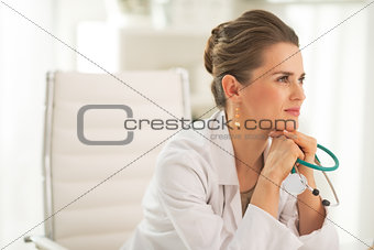 Portrait of doctor woman with stethoscope in office