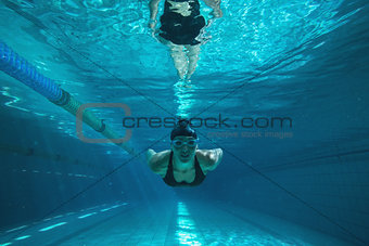 Athletic swimmer training on her own