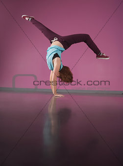 Pretty break dancer doing handstand