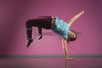 Pretty break dancer doing a handstand