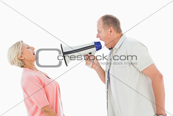 Man shouting at his partner through megaphone