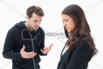 Unhappy brunette listening to boyfriend