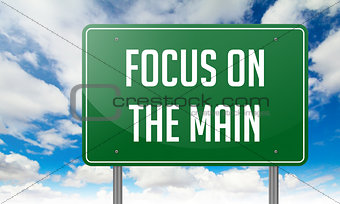 Focus on the Main in Highway Signpost.