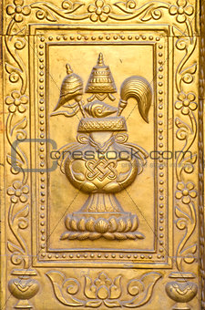 golden gilded asian temple door ornamental fragment