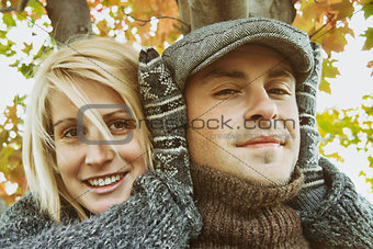 Young couple having some autumn fun